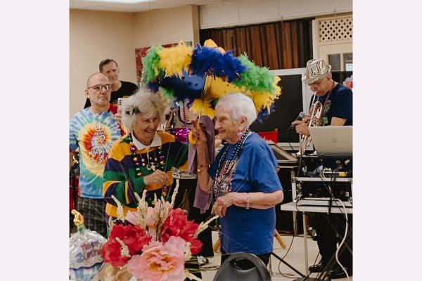 two new orleans seniors celebrate a century hero