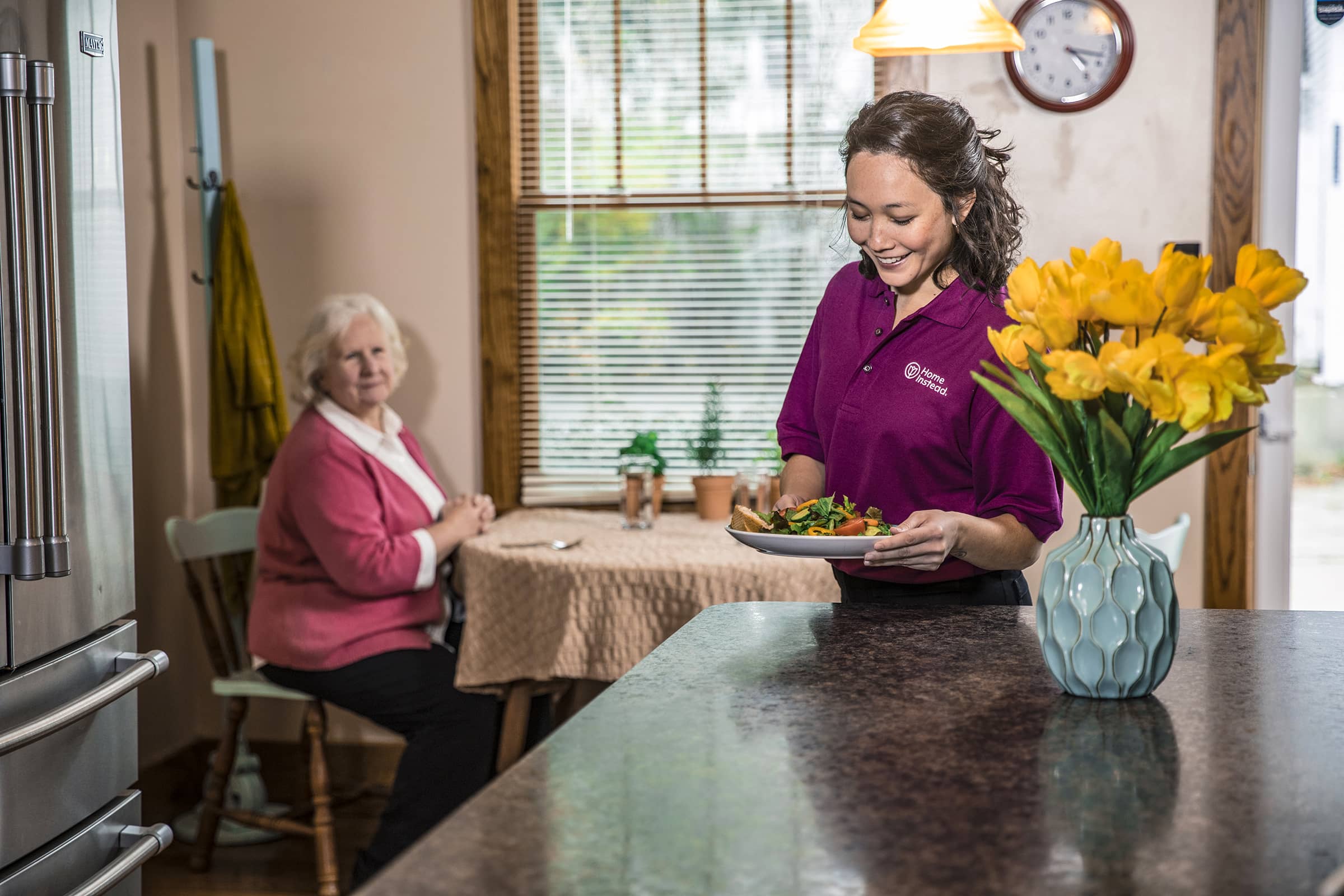 Home Instead Care Pro and Calgary Senior in the kitchen 1 