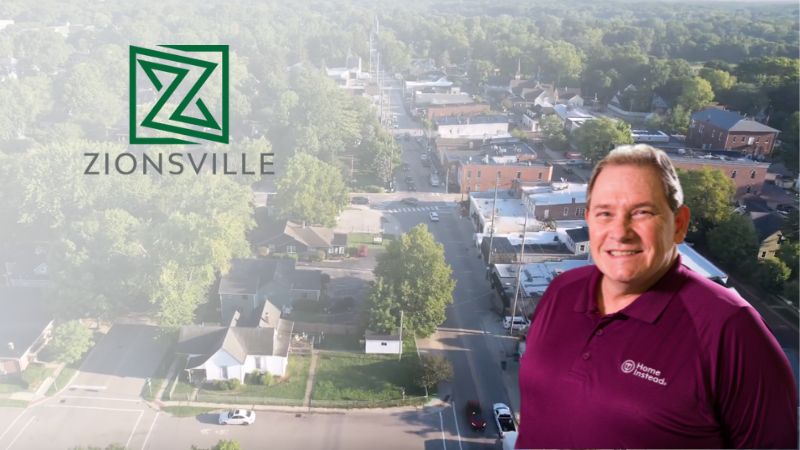 Home Instead caregiver with Zionsville Indiana in the background