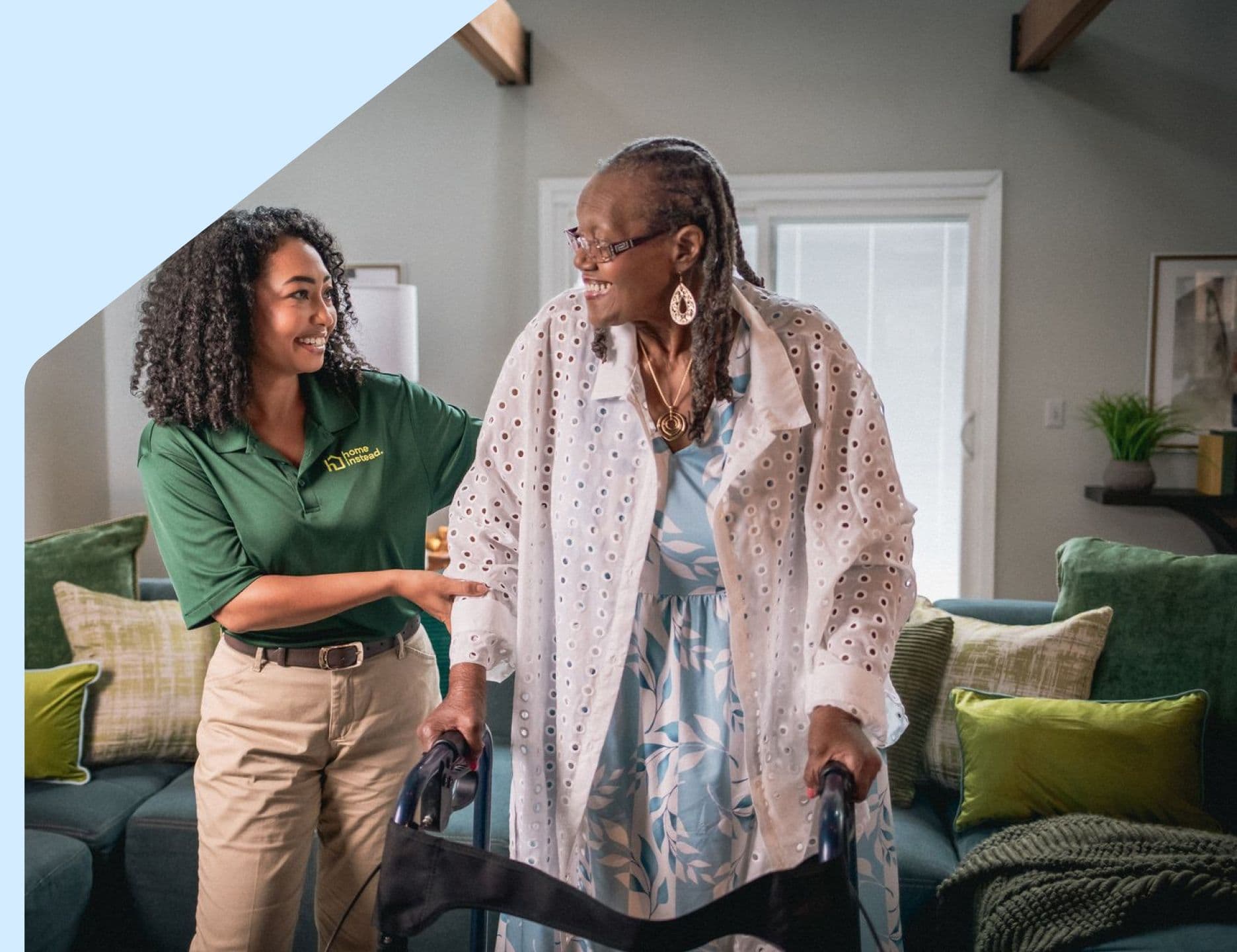 A Home Instead senior caregiver helping