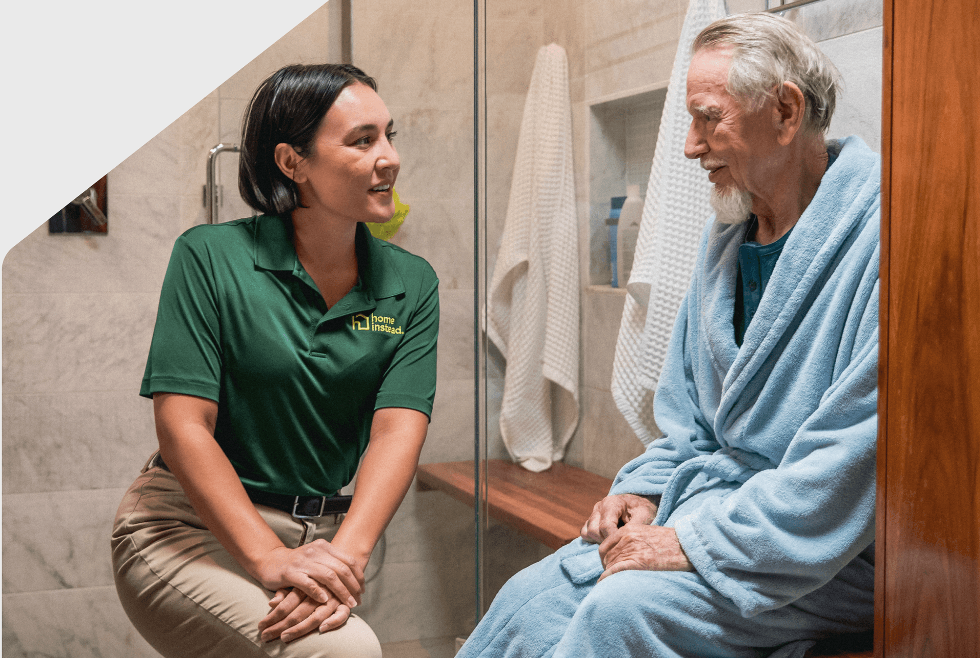 A Home Instead Care Pro with an adult.