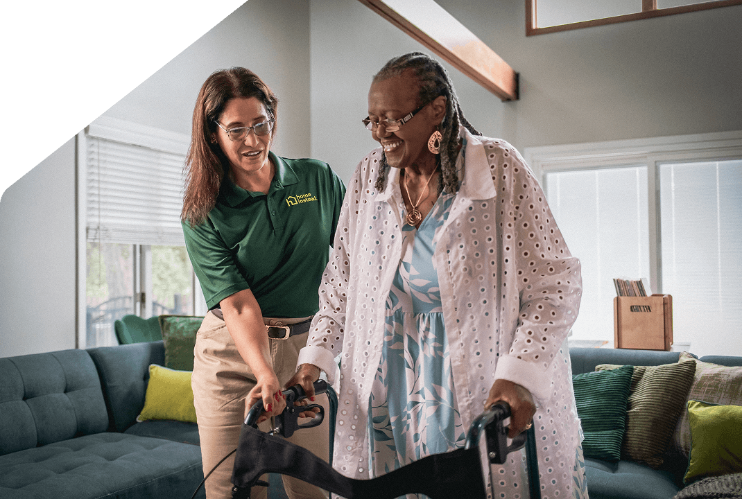 A Home Instead Care Pro with an adult.