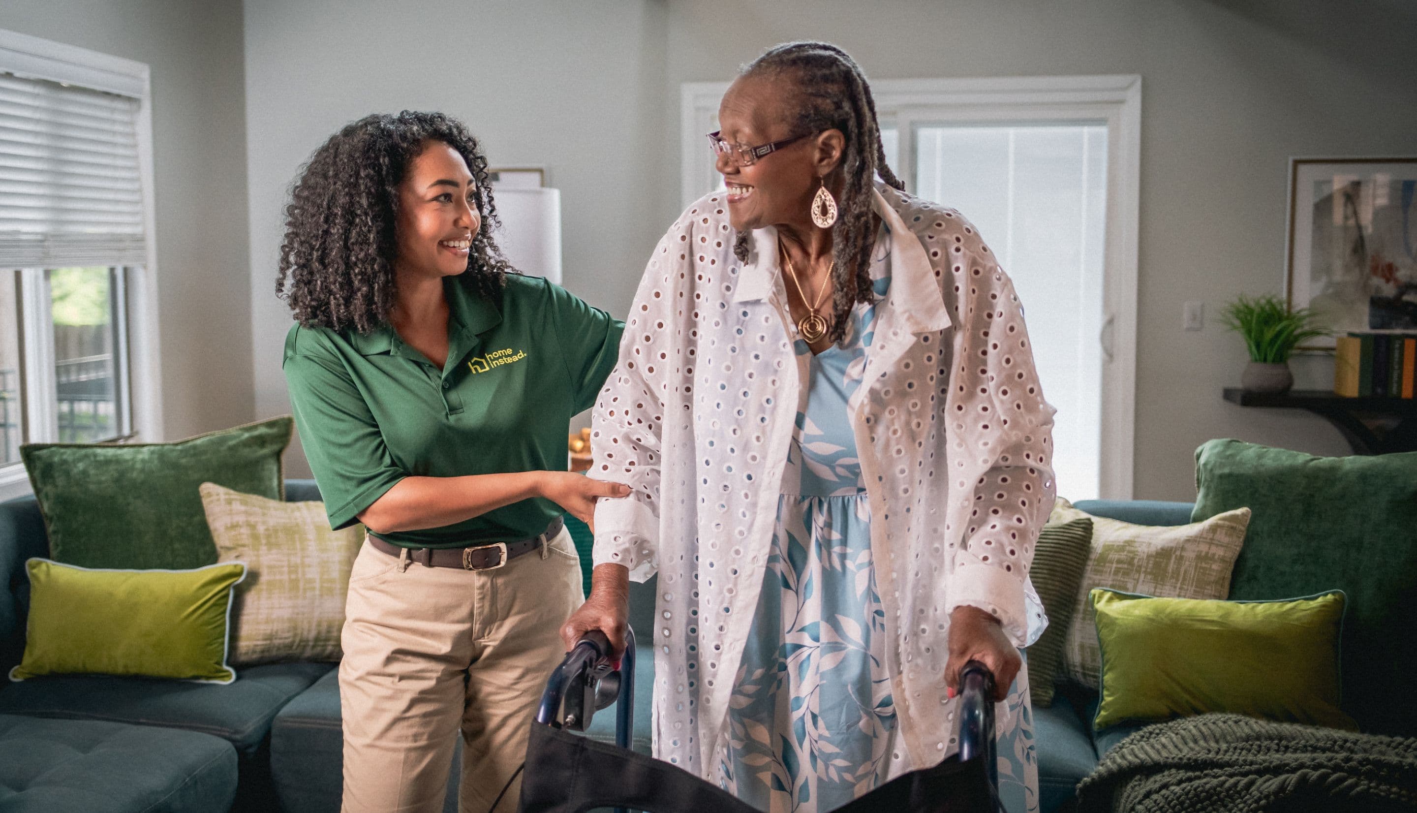 A Home Instead Care Pro with an adult.