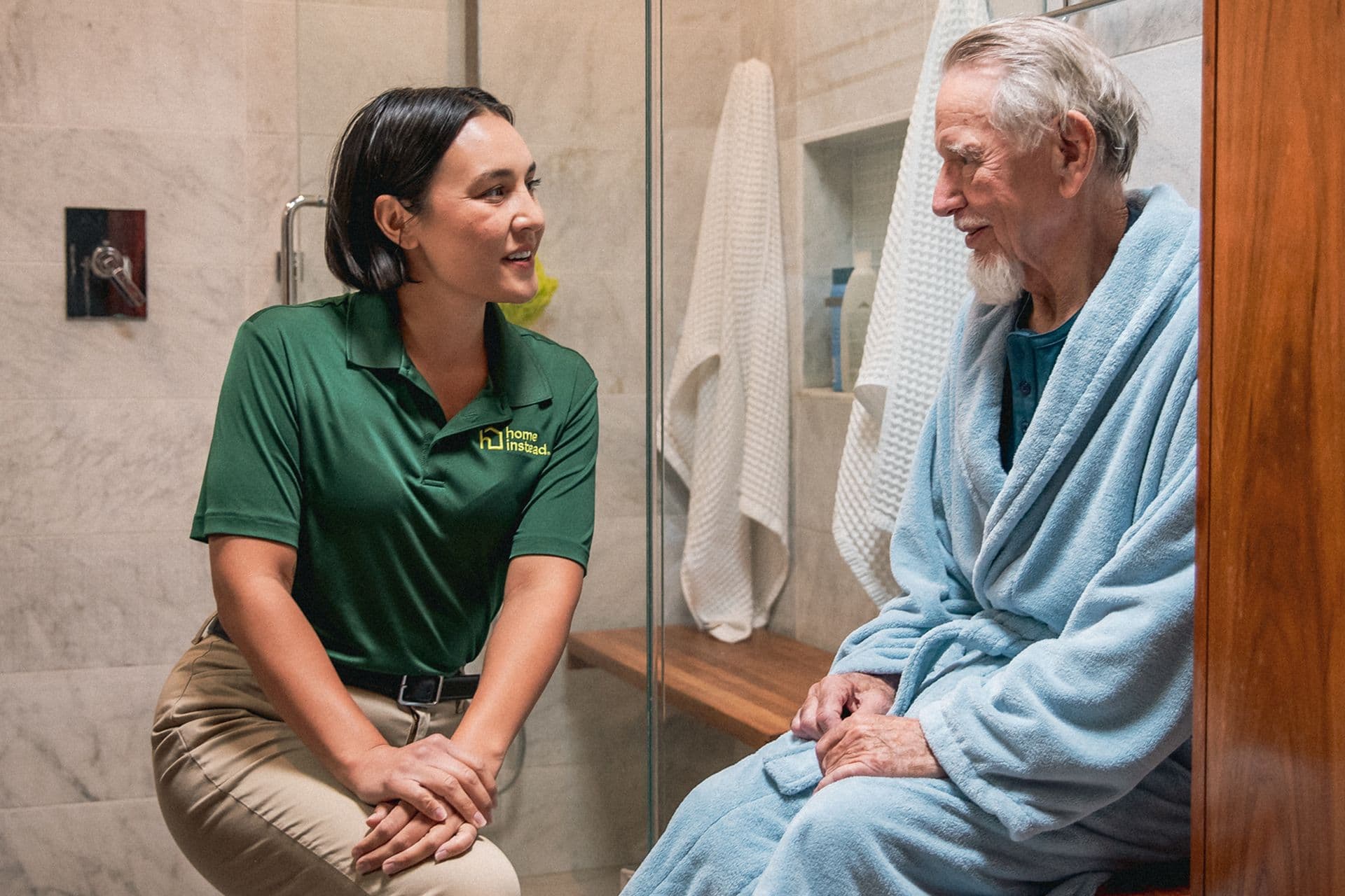 A Home Instead Care Pro with an adult.