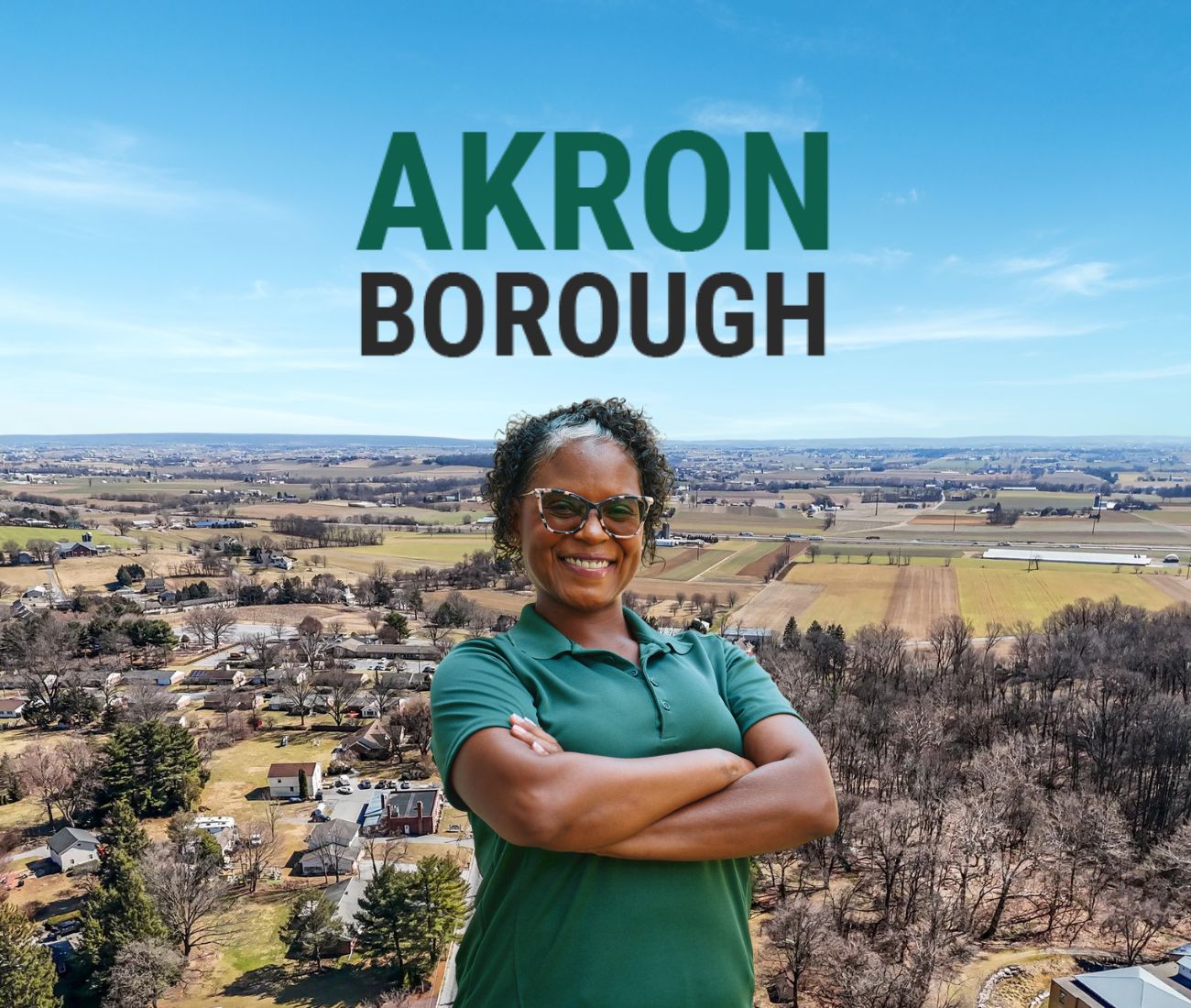 Home Instead caregiver with Akron, Pennsylvania in the background