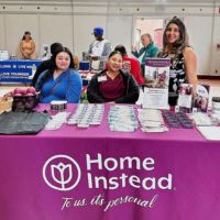 home instead booth at city of everett health fair