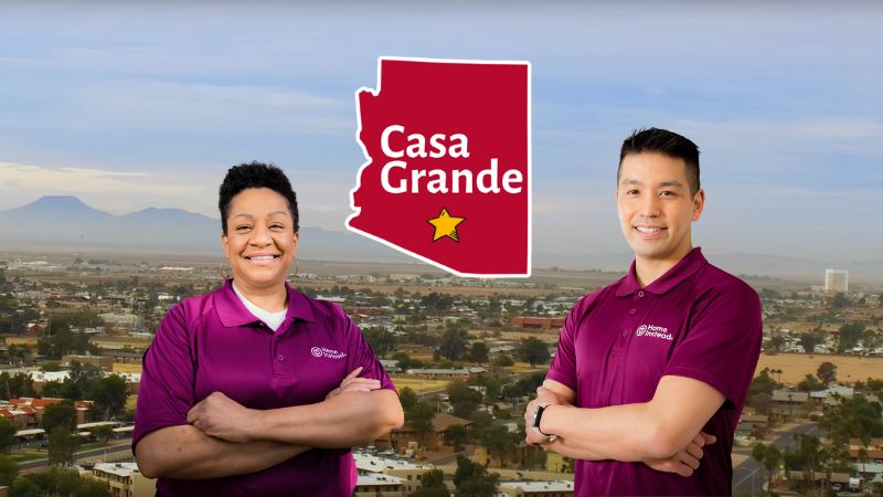 Home Instead caregivers with Casa Grande, Arizona in the background