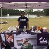 home instead worker at moore county senior event