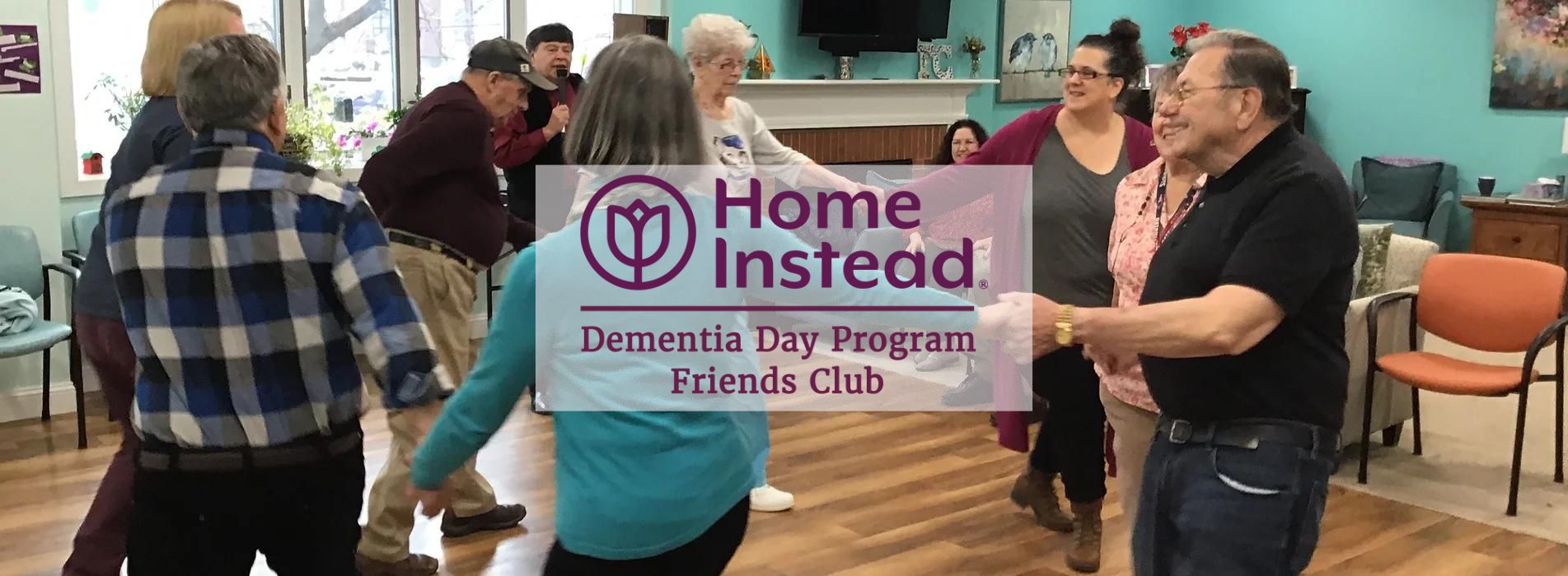 seniors enjoying a dance at the dementia day friends club