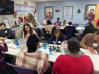 The Home Instead Team Wrapping BASTAS Gifts