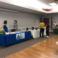 sponsors at a health and wellness fair in southern pines north carolina