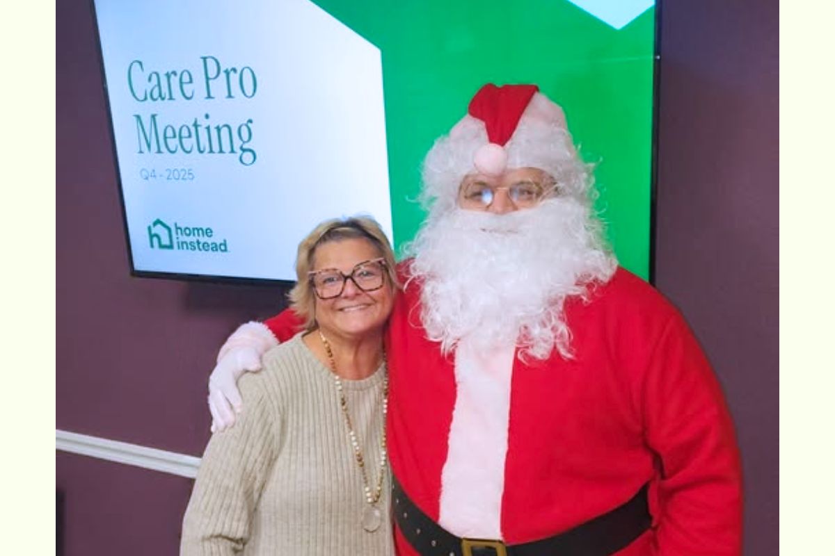 Home Instead Has a Surprise Visitor During December Caregiver Meeting