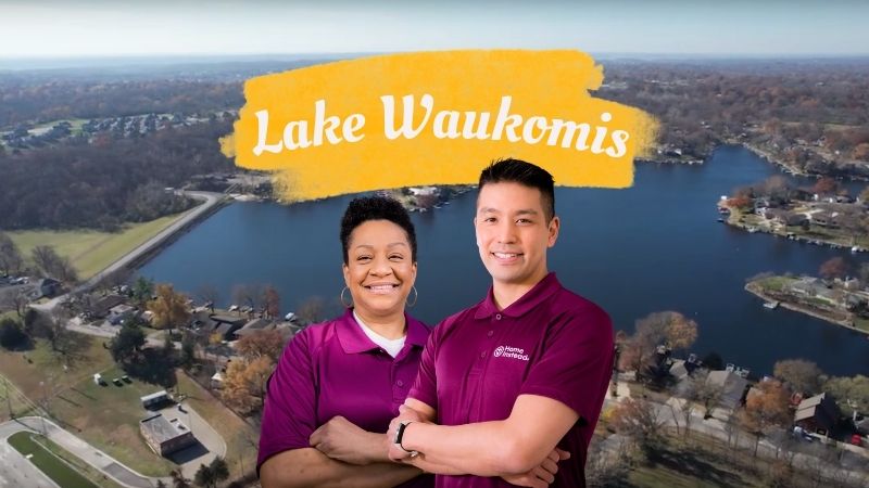 Home Instead caregivers with Lake Waukomis Missouri in the background