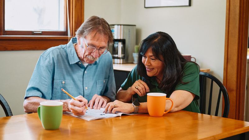 Home Instead caregiver and senior client