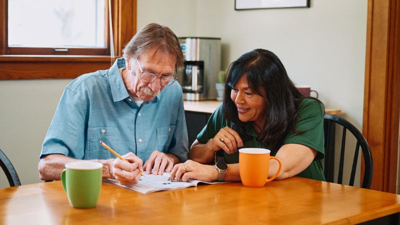 Home Instead caregiver and senior client