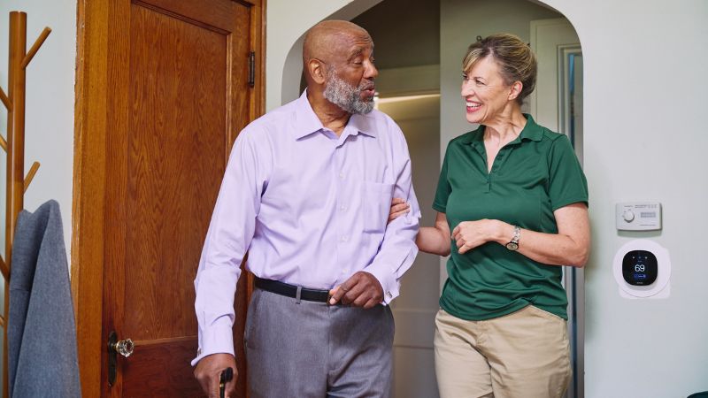 Home Instead caregiver with senior client