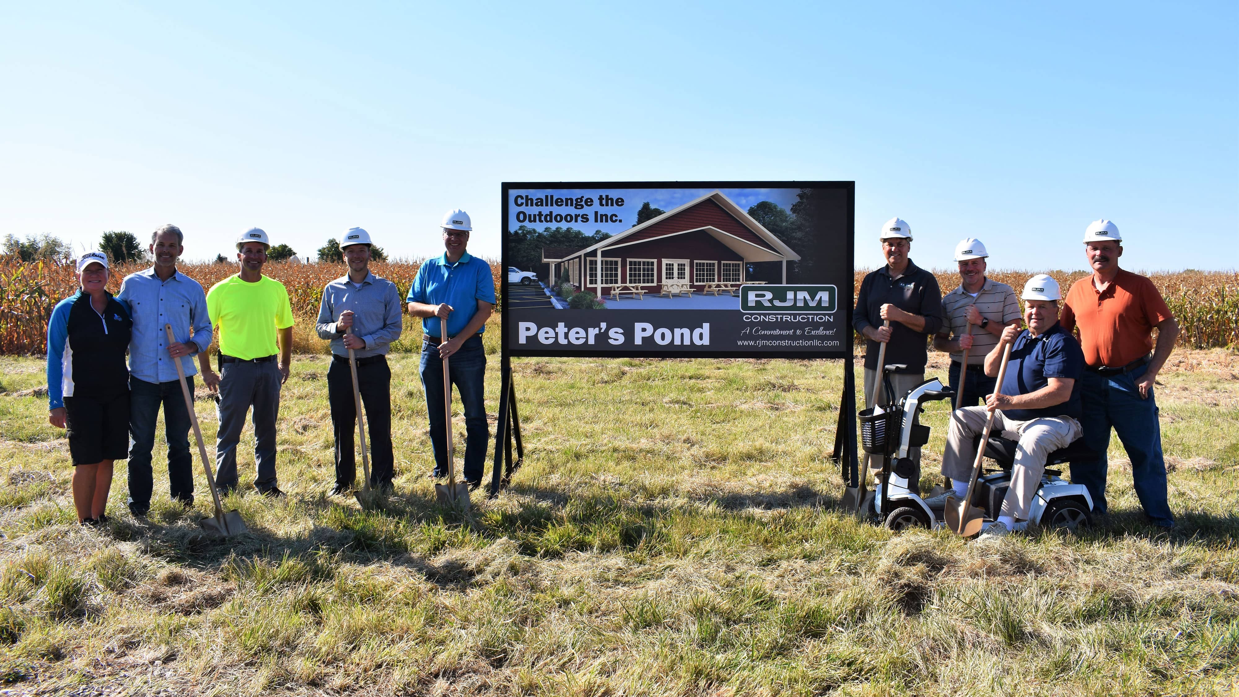 Pictured left to right: Kristi Nooyen, Steve Nooyen, Ryan Minlschmidt, James Nooyen, Joe Toonen, Bob Glidden, Tim Temby, Keith Pamperin and Carl Gierke. © Challenge the Outdoors, Inc. All rights reserved.