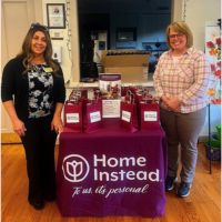 home instead booth at educational lunch and learn in stoneham