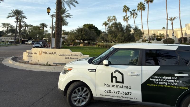 Home Instead car with Victory at Verrado, Buckeye, AZ in the background