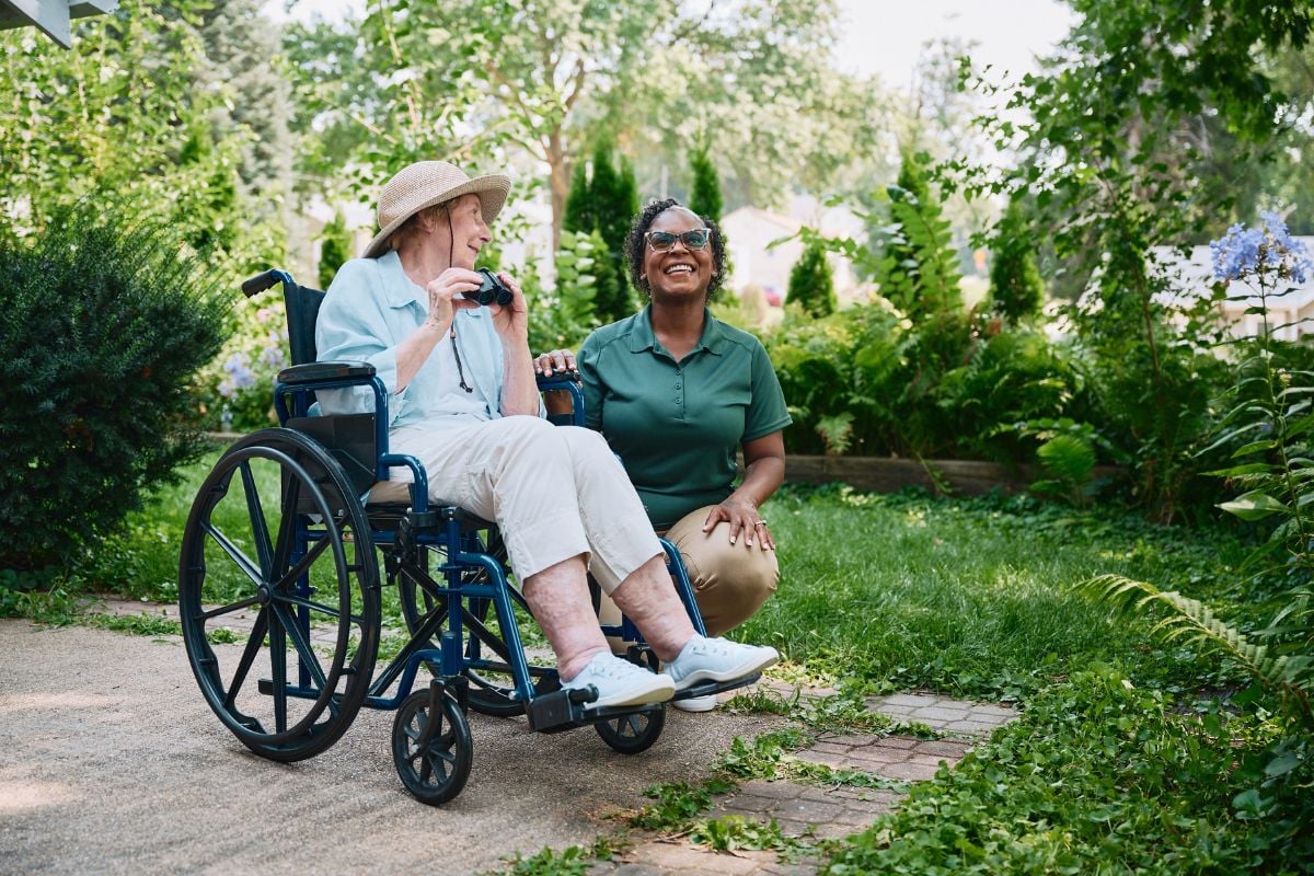 home instead caregiver with senior client