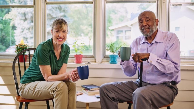 Home Instead caregiver with senior client