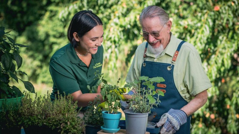 Home Instead caregiver with senior client
