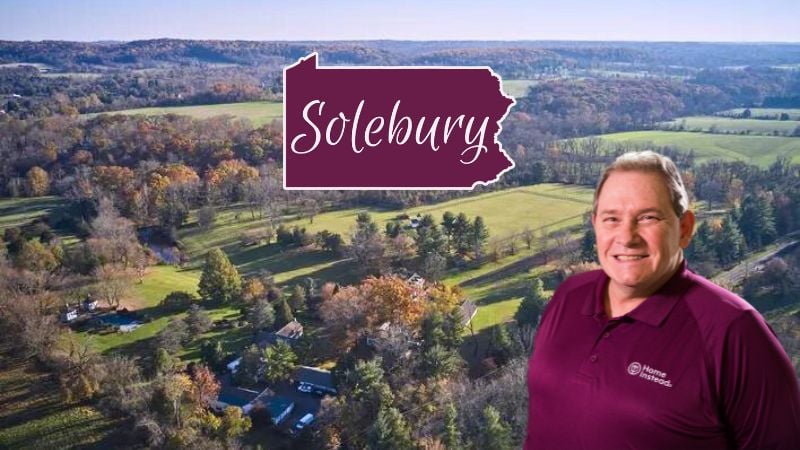 Home Instead caregiver with Solebury, PA in the background