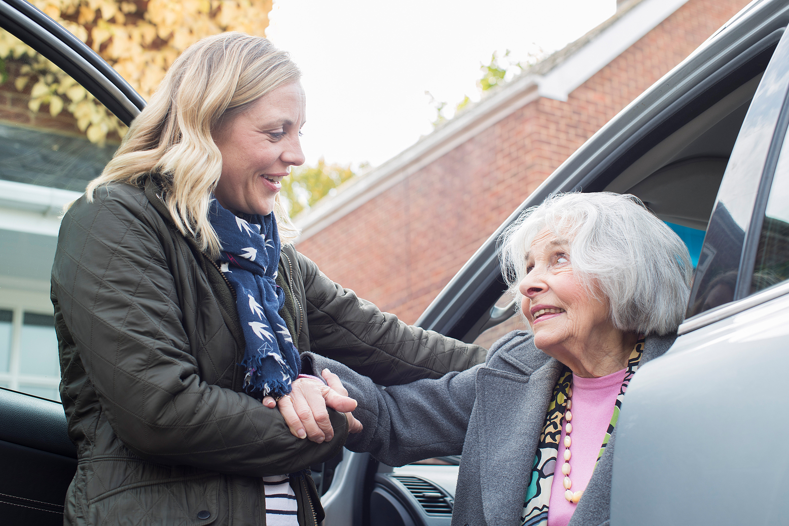 bigstock Female Neighbor Giving Senior 266043193 1 2