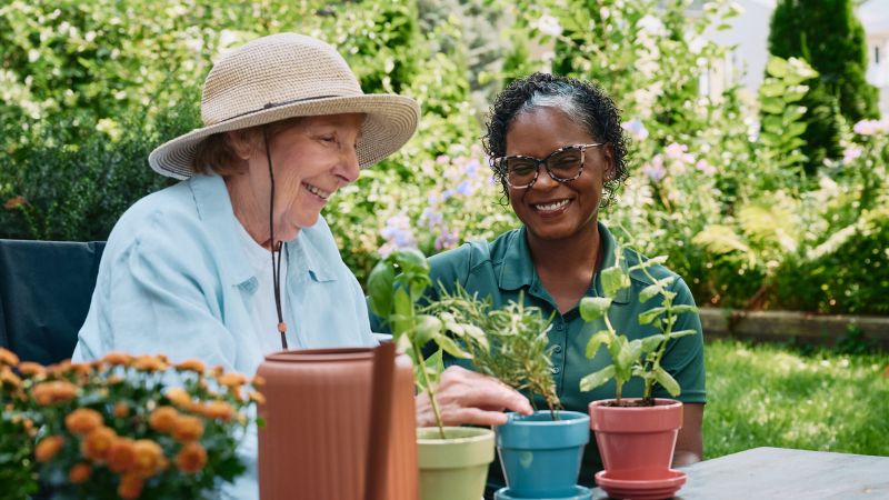 Home Instead caregiver and senior client