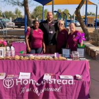 home instead care team at walk to end alzheimers booth