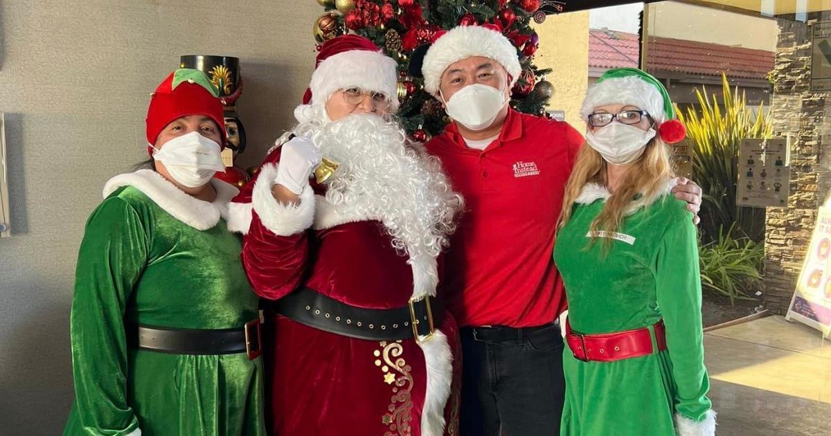 Home Instead Delivers Gifts for Be a Santa to a Senior