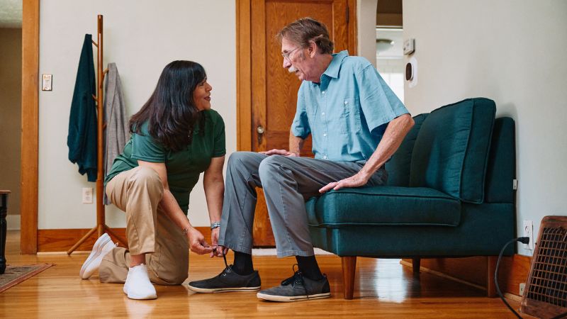 Home Instead caregiver with senior client