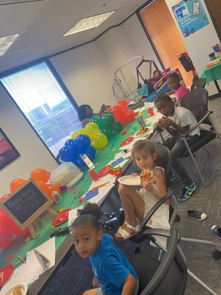 Home Instead Hosts a Fun Back-to-School Day for Kids in Houston, TX pizza party