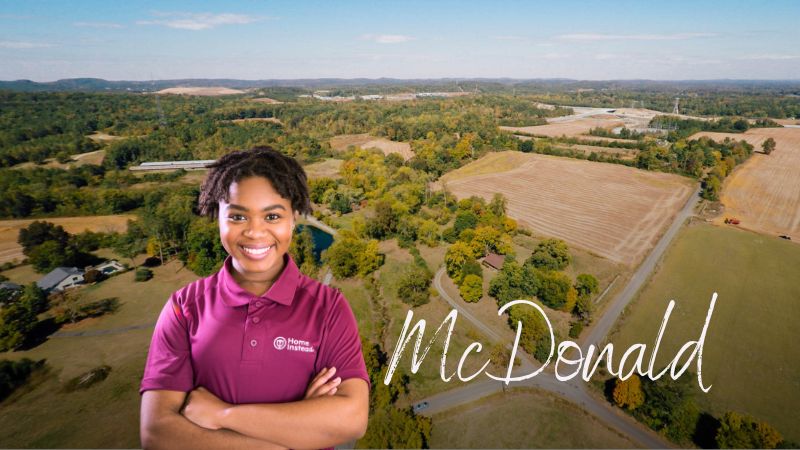 Home Instead caregiver with McDonald Tennessee in the background