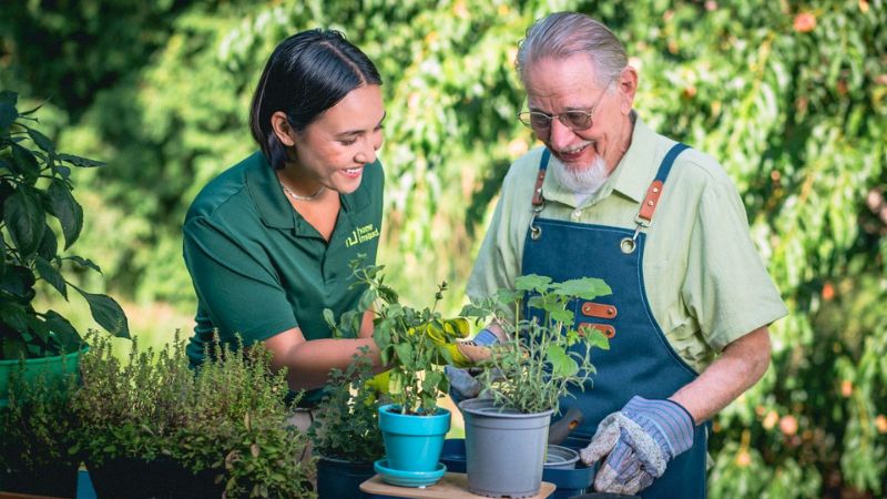 Home Instead caregiver and senior client