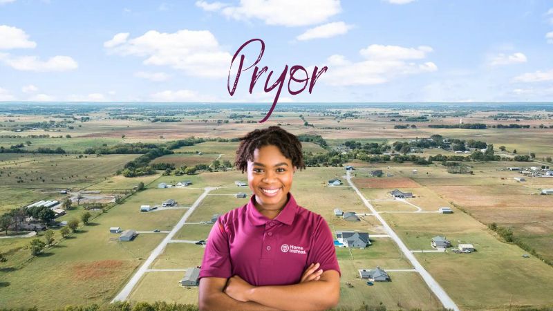 Home Instead caregiver with Pryor Oklahoma in the background