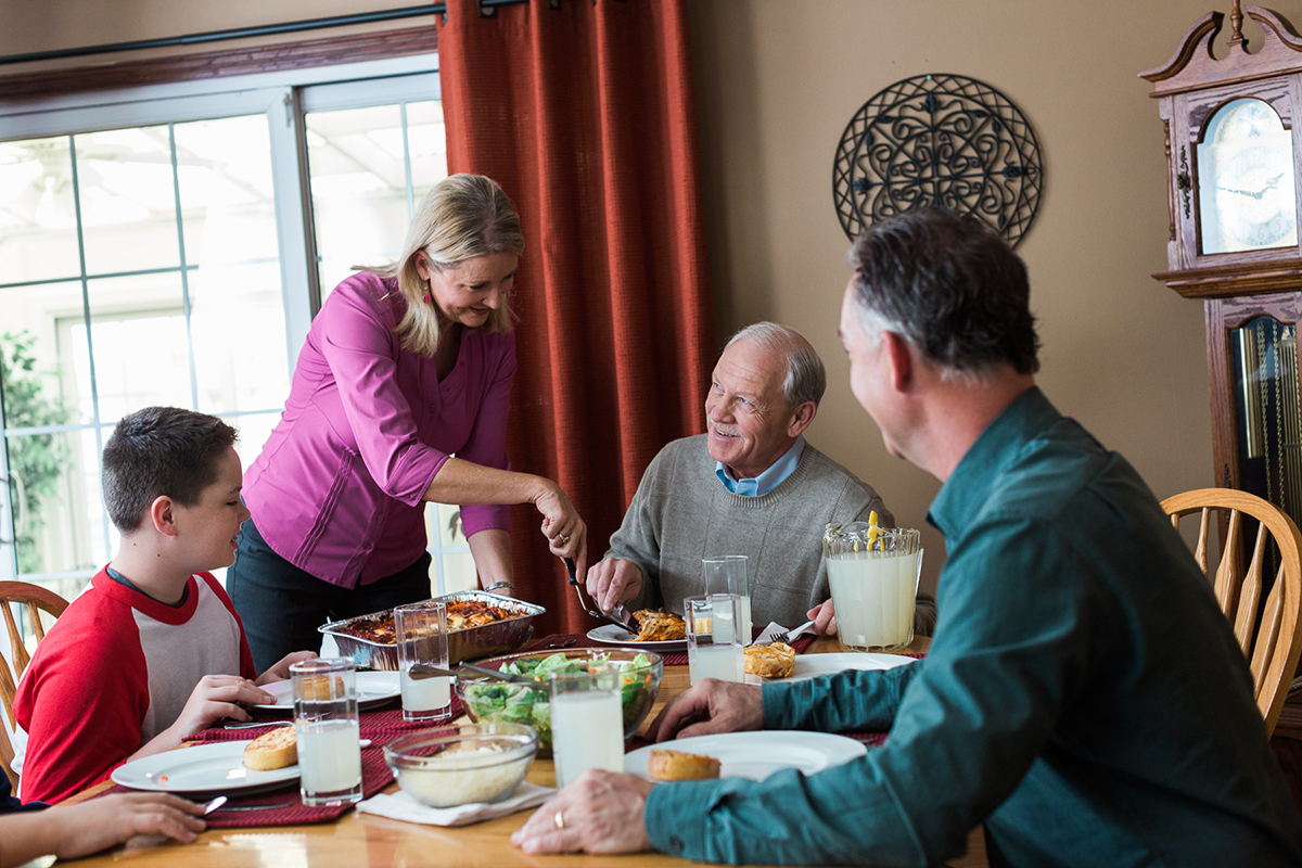 Seniors enjoying mealtime with family