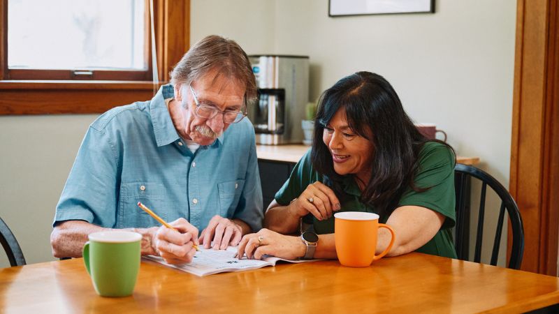 Home Instead caregiver with senior client in Reno, NV