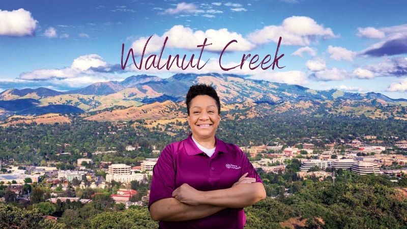 Home Instead caregiver with Walnut Creek California in the background