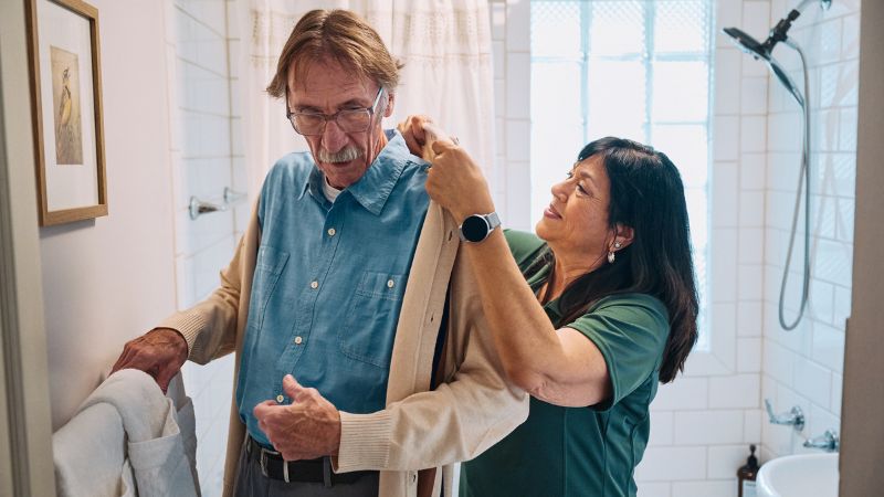 Home Instead caregiver with senior client