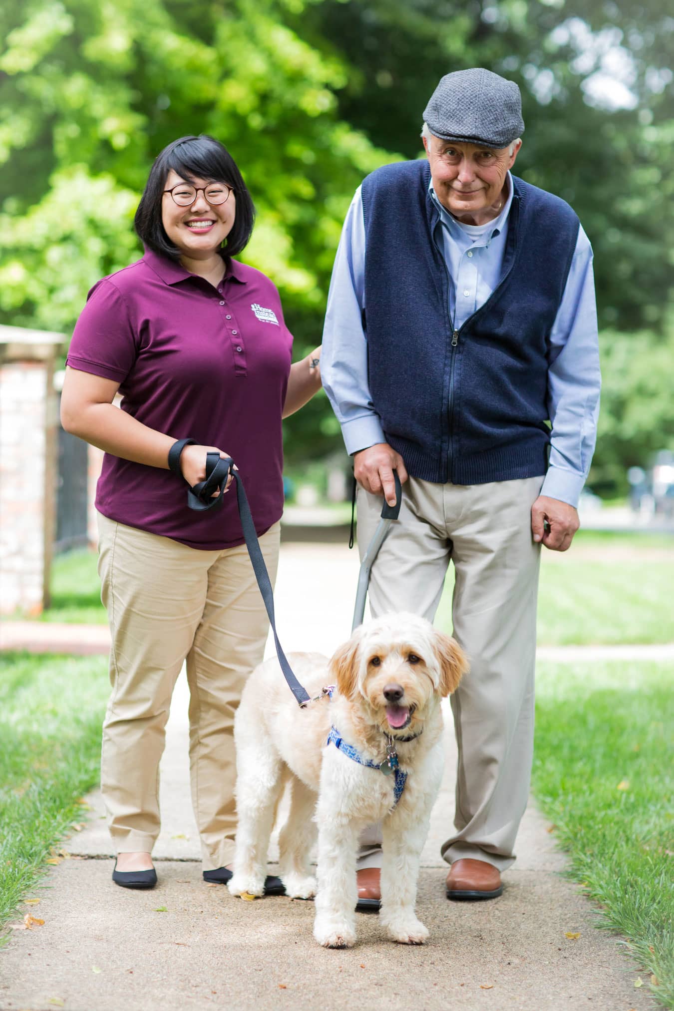 CAREGiver and senior male walking dog 2 COMP