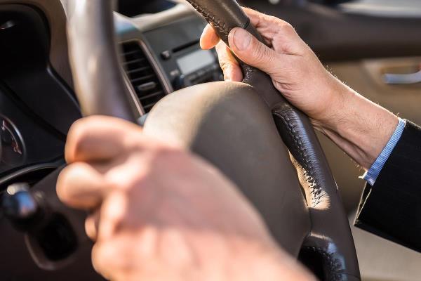 bigstock Man Driving Car 89409368