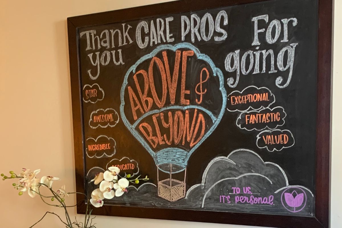 Home Instead of Wilmington, Delaware chalkboard with grateful message to caregiver team