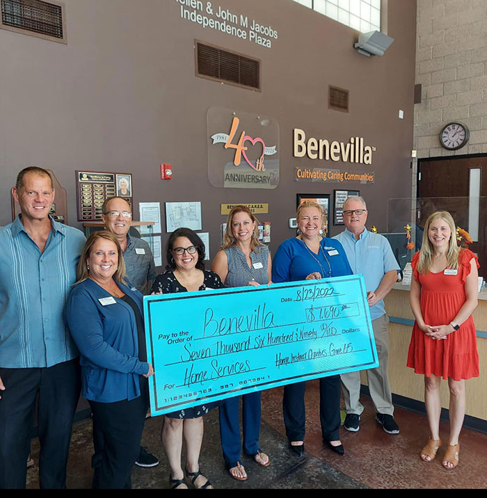 Home Instead Helps Raise Money for Benevilla Give65 check
