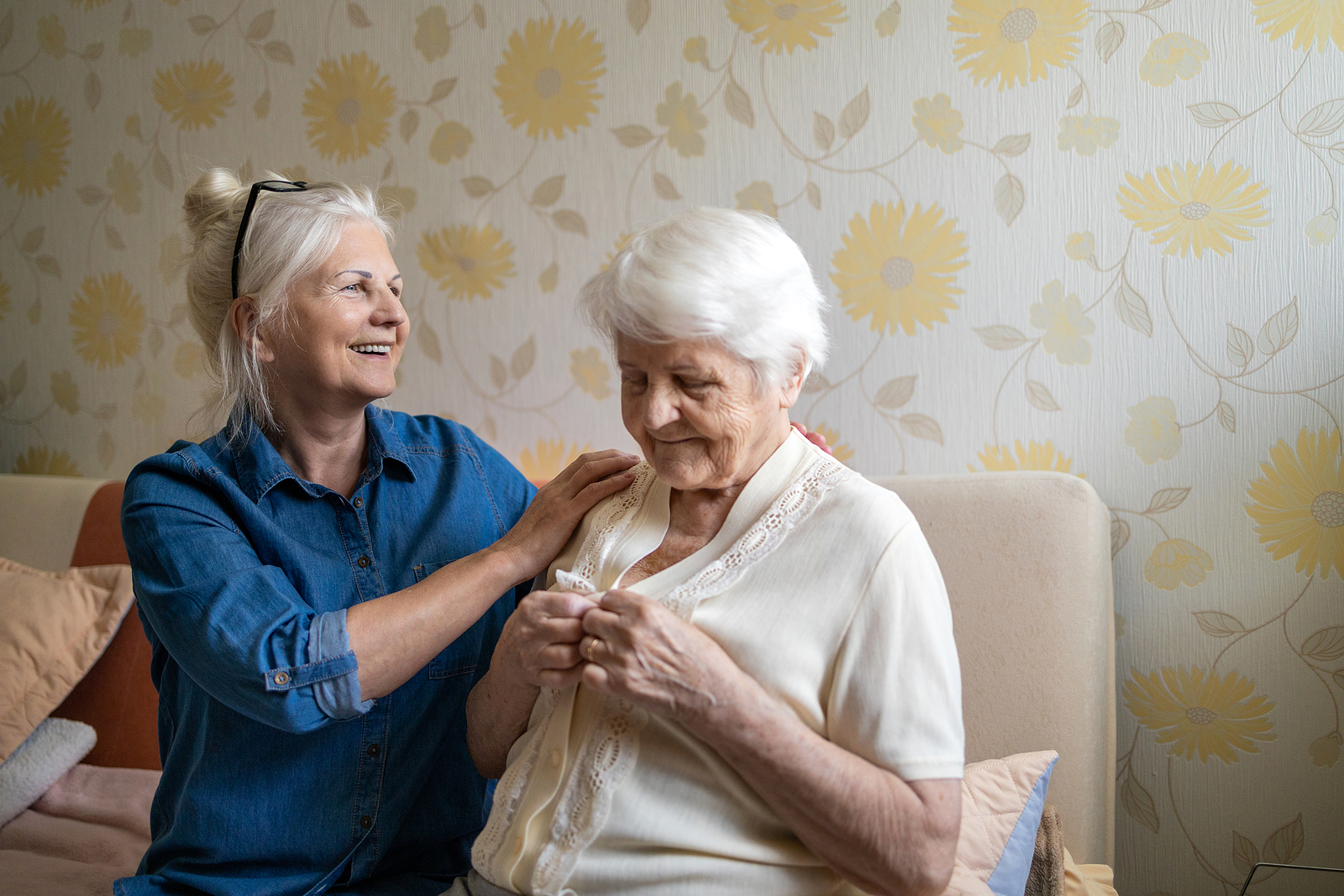 bigstock caregiver helping senior woman dre 371060062