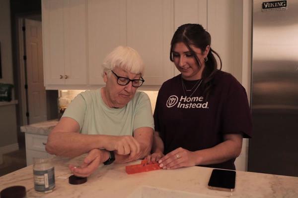 Care Pro helping a senior organize their medications