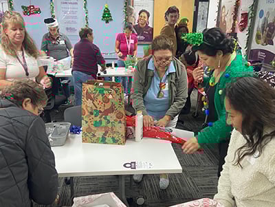 Home Instead Team Wrapping BASTAS Gifts 2 