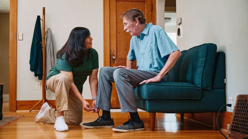 Home Instead caregiver with Vestavia Hills, AL in the background