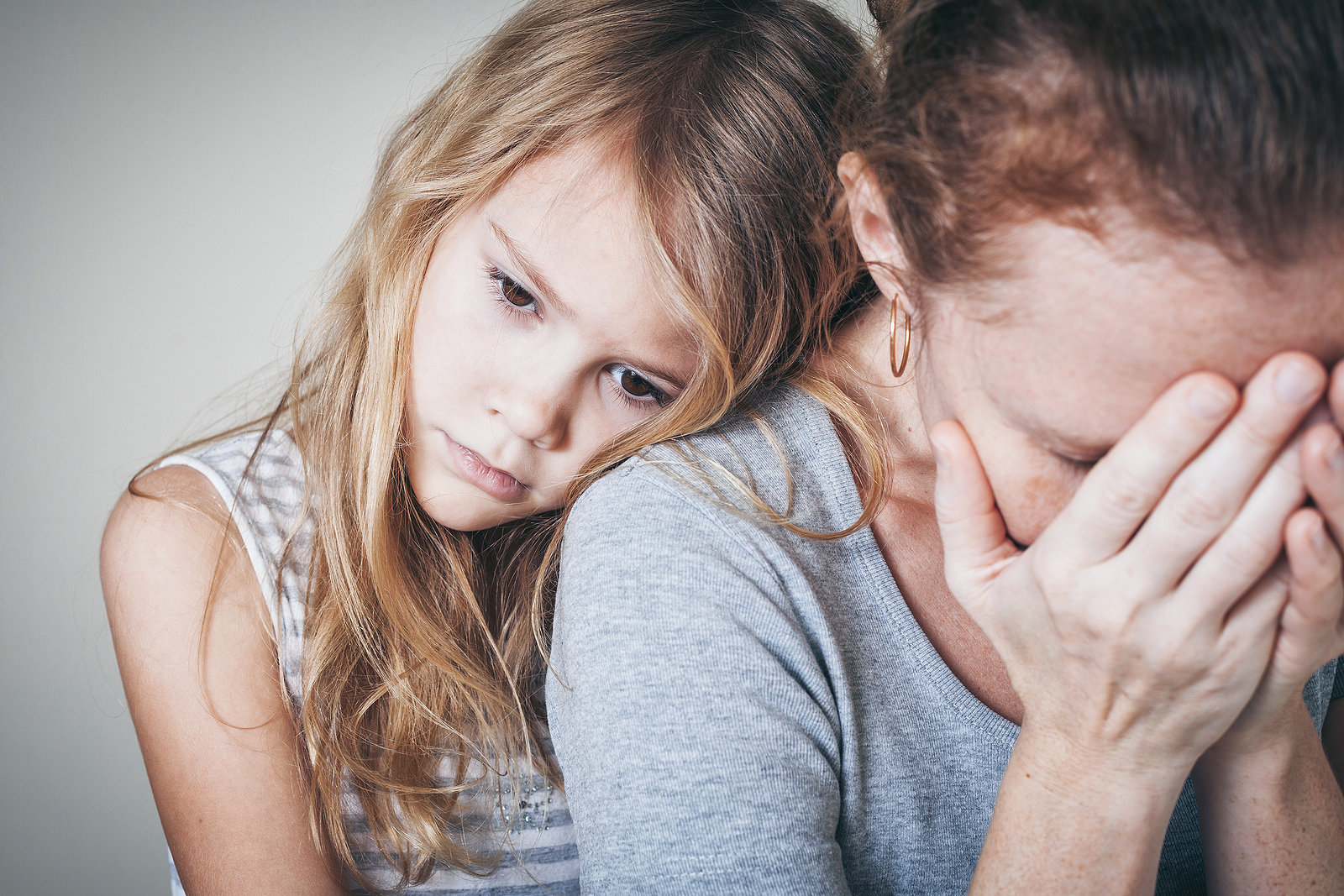 bigstock Sad Daughter Hugging His Mothe 121464467
