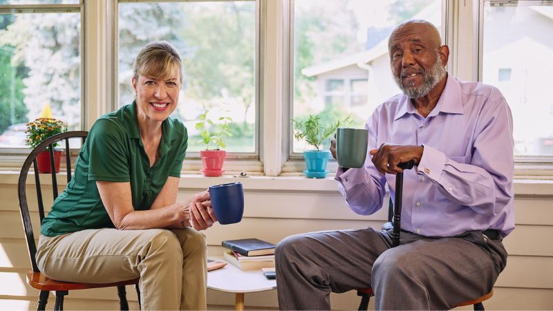 Home Instead caregiver with senior client